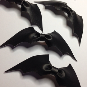 Leather Bat Bow